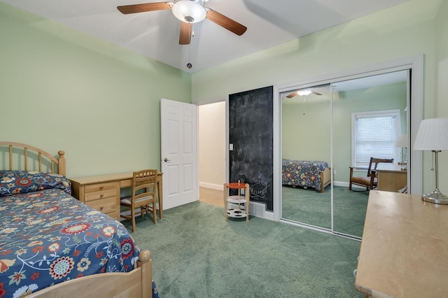 carpeted bedroom featuring baseboards, ceiling fan, and a closet