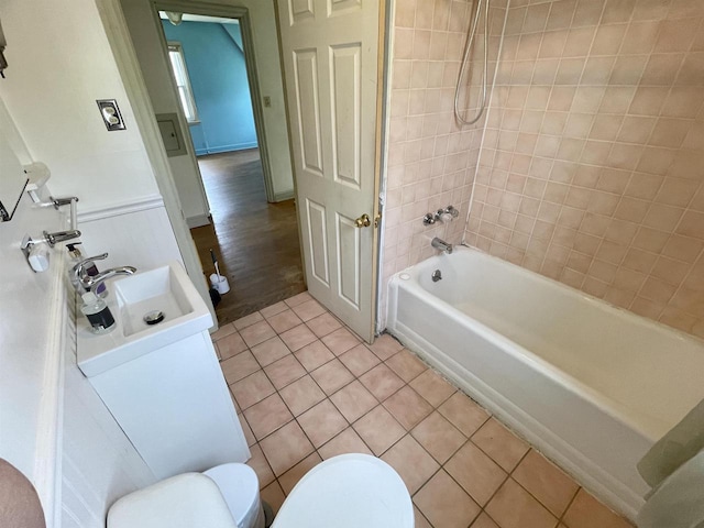 227 1st St, Baraboo, WI 53913 - full bathroom featuring tile patterned flooring, shower / bathing tub combination, toilet, and vanity