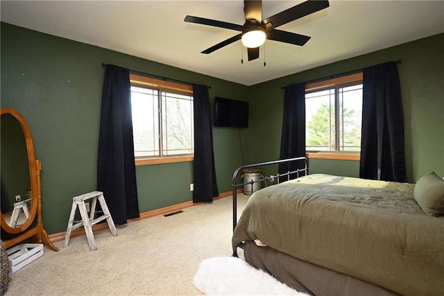 4410 Echo Valley Dr, Eau Claire, WI 54701 - bedroom featuring baseboards, multiple windows, carpet flooring, and visible vents