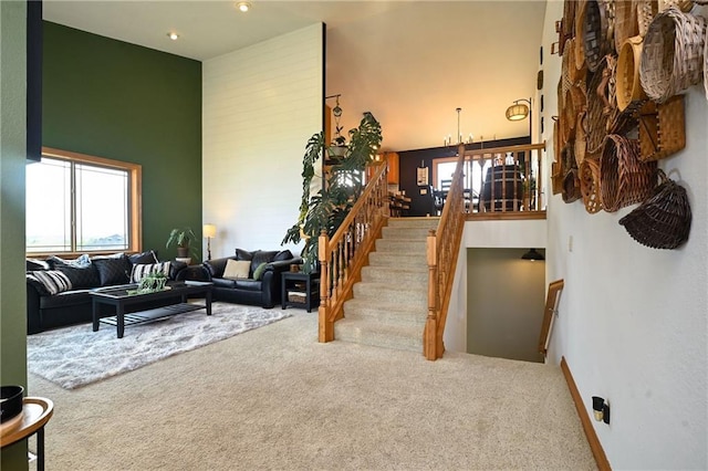 4410 Echo Valley Dr, Eau Claire, WI 54701 - living area featuring stairway, a high ceiling, recessed lighting, and carpet