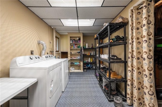 3434 Hester St, Eau Claire, WI 54701 - clothes washing area featuring washing machine and clothes dryer, laundry area, and carpet