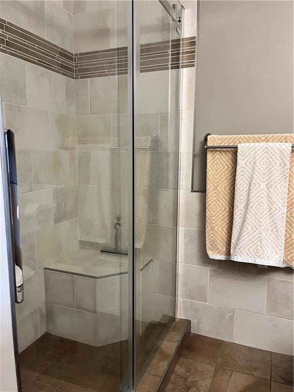 bathroom with a stall shower