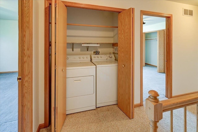 555 Kelvington Dr Unit 4, Sun Prairie, WI 53590 - laundry area with independent washer and dryer and light colored carpet