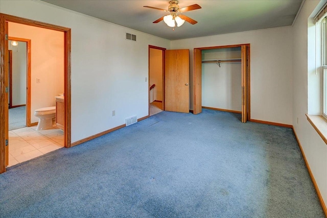 555 Kelvington Dr Unit 4, Sun Prairie, WI 53590 - unfurnished bedroom with carpet floors, a closet, baseboards, and multiple windows