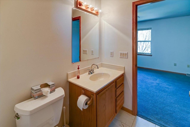 555 Kelvington Dr Unit 4, Sun Prairie, WI 53590 - bathroom with vanity, toilet, and baseboards