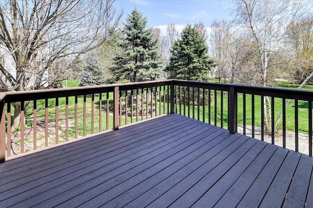 555 Kelvington Dr Unit 4, Sun Prairie, WI 53590 - wooden deck featuring a lawn