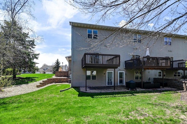 555 Kelvington Dr Unit 4, Sun Prairie, WI 53590 - back of house featuring a yard and a deck