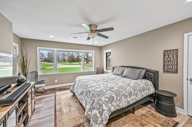 bedroom with baseboards, ceiling fan, recessed lighting, and wood finished floors