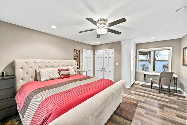 bedroom with baseboards, ceiling fan, recessed lighting, and wood finished floors