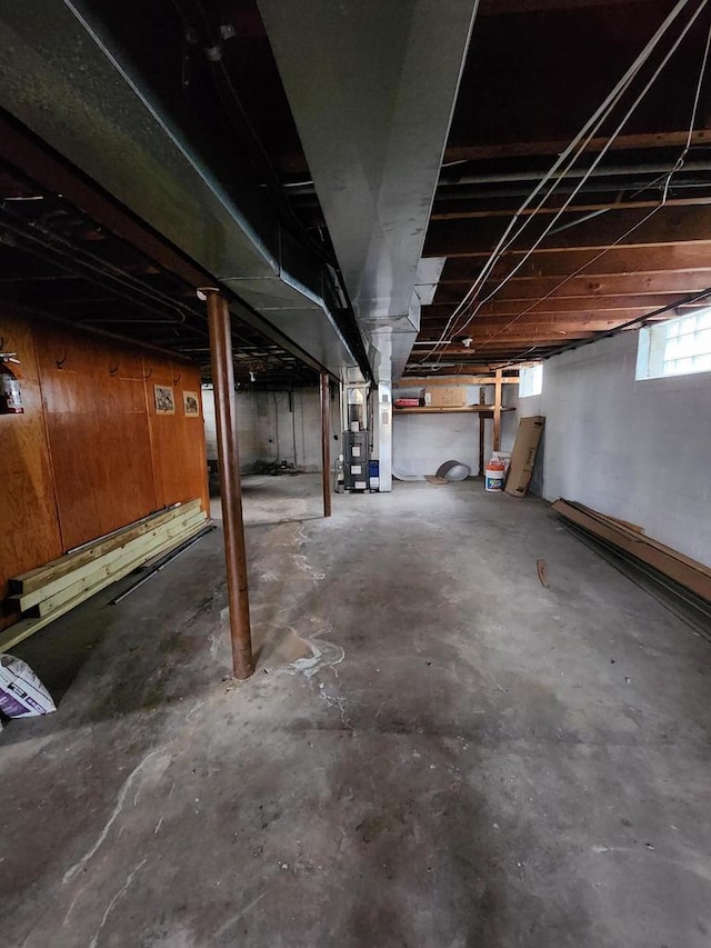 basement featuring heating unit
