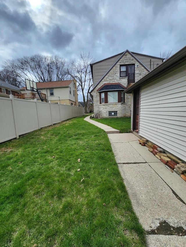 view of yard with fence