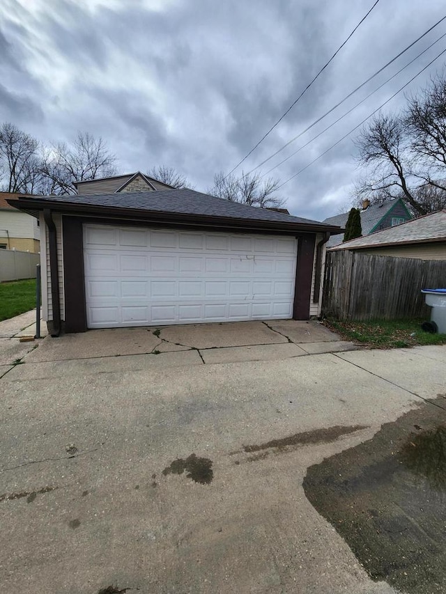 detached garage with fence