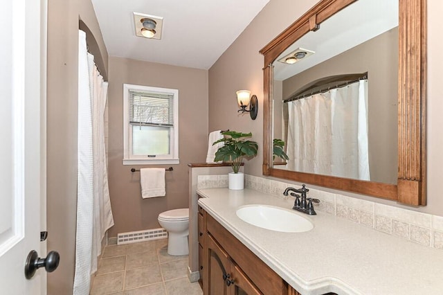 full bathroom featuring toilet, tile patterned floors, visible vents, and vanity