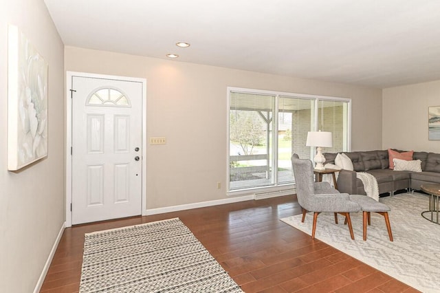 foyer entrance featuring recessed lighting, baseboards, and wood finished floors