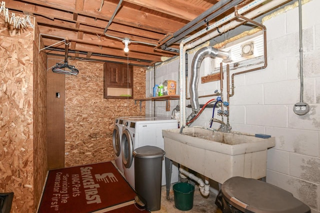 laundry area with laundry area and washer and clothes dryer