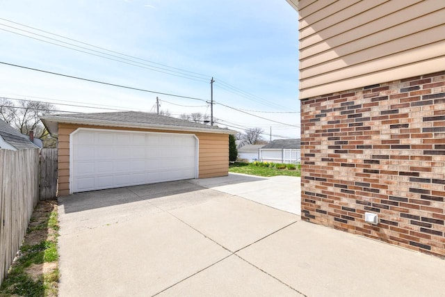 detached garage with fence