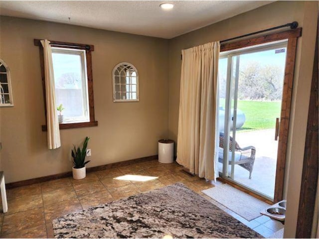 interior space with baseboards