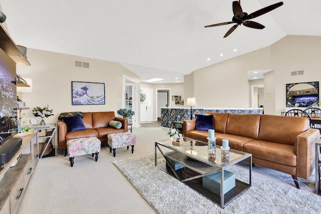 carpeted living area with vaulted ceiling, a ceiling fan, recessed lighting, and visible vents