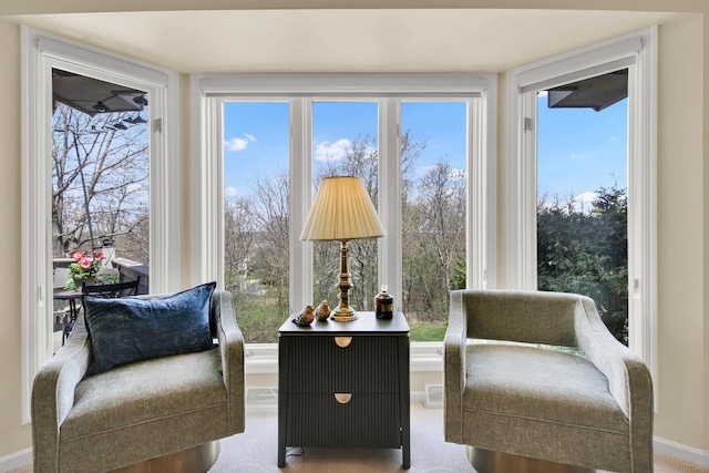 living area with carpet