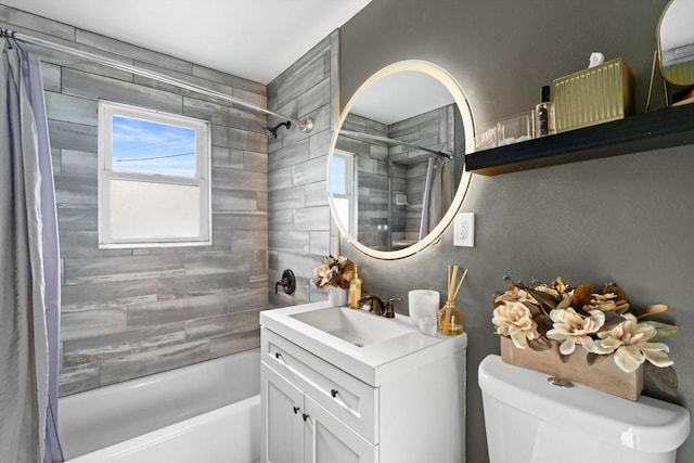 full bath featuring vanity, toilet, and shower / tub combo with curtain