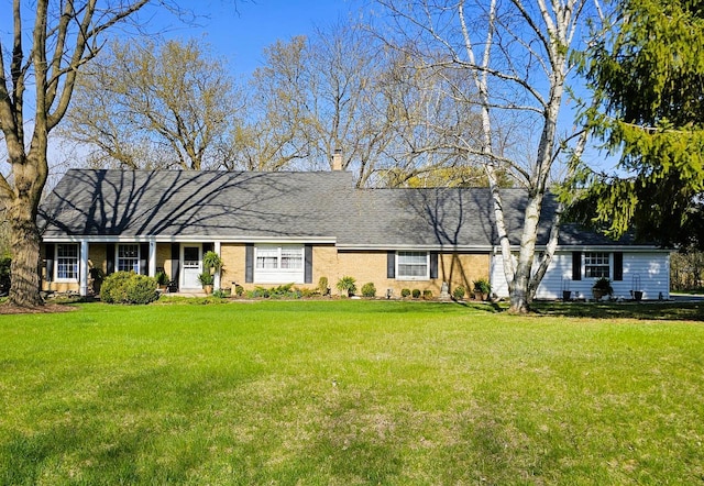 ranch-style home with a front yard