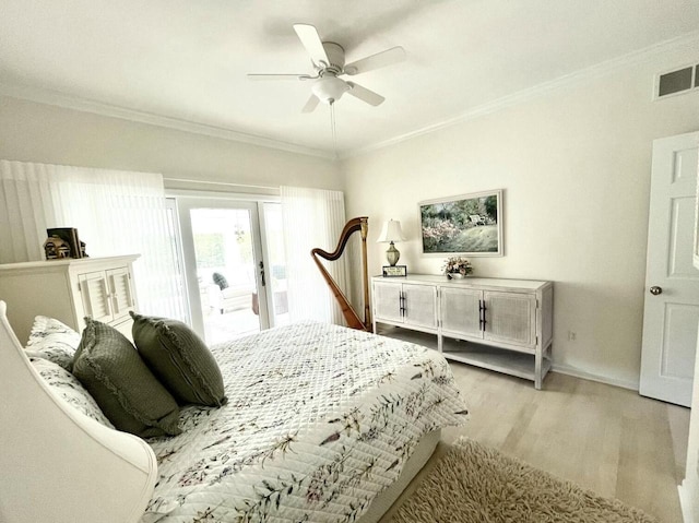 bedroom with light wood-style floors, access to outside, ornamental molding, and visible vents
