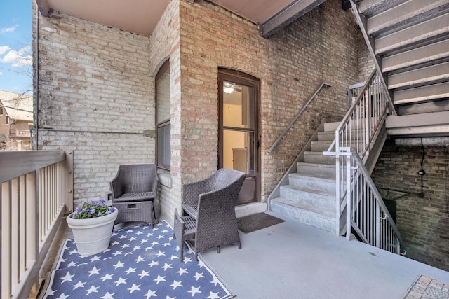 view of patio / terrace featuring stairs