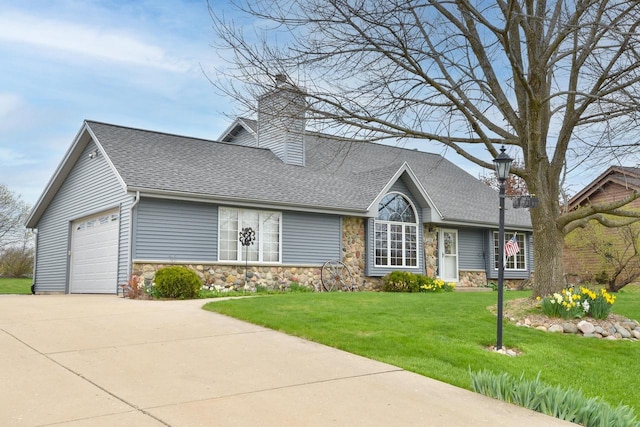 view of front facade featuring a shingled roof, a front yard, stone siding, and concrete driveway