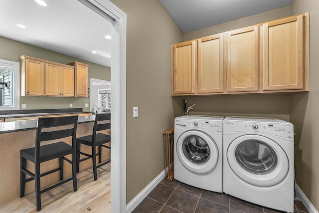 washroom with baseboards, cabinet space, recessed lighting, and independent washer and dryer