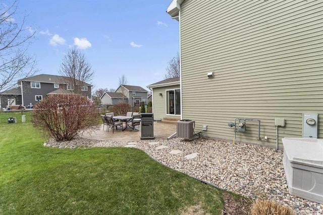 exterior space featuring a patio, fence, central air condition unit, and a residential view