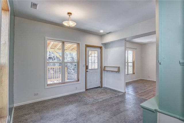 603 Dodge St, Eau Claire, WI 54701 - entryway with recessed lighting, baseboards, and visible vents