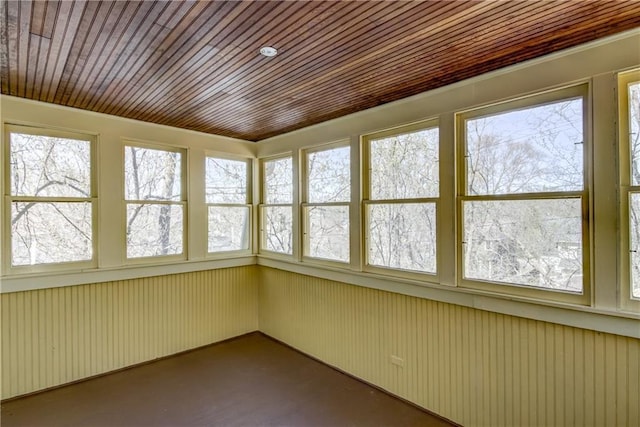 603 Dodge St, Eau Claire, WI 54701 - unfurnished sunroom featuring wood ceiling