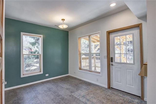 603 Dodge St, Eau Claire, WI 54701 - doorway with baseboards and a wealth of natural light