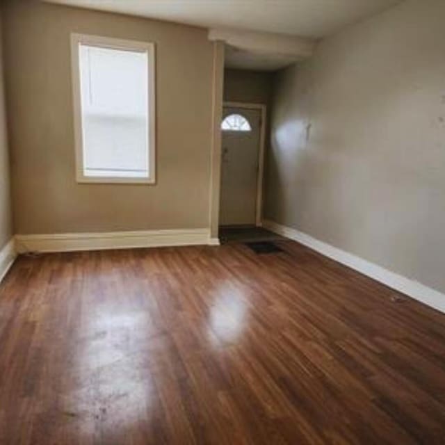 1312 Center St, Racine, WI 53403 - foyer with baseboards and wood finished floors