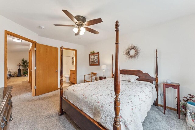 2017 Retzlaff Dr, Reedsburg, WI 53959 - bedroom with ceiling fan, light carpet, and ensuite bath