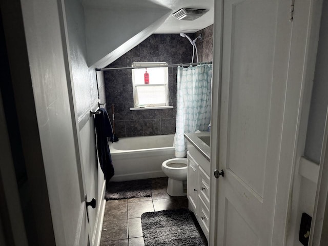 bathroom with visible vents, shower / tub combo with curtain, vanity, toilet, and tile patterned floors
