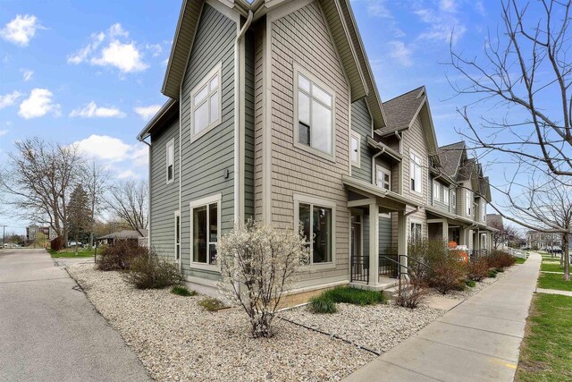 view of side of home featuring a residential view