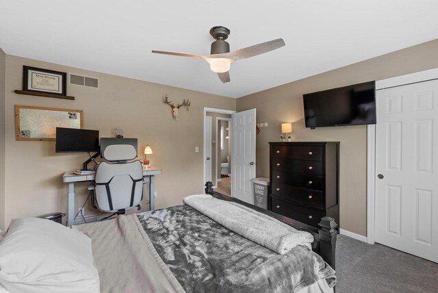 bedroom with baseboards, ceiling fan, carpet flooring, and visible vents