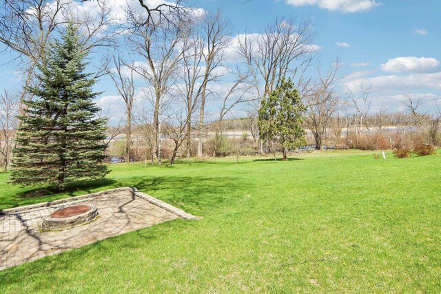 N6376 Hillcrest Rd, Pardeeville, WI 53954 - view of yard with a patio area and an outdoor fire pit