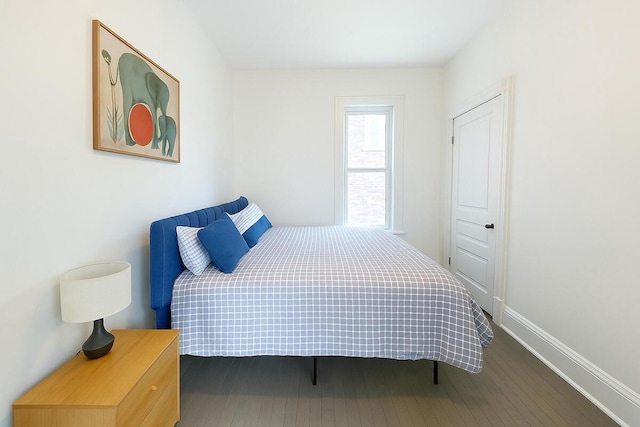bedroom featuring baseboards