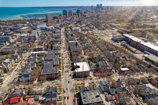 bird's eye view with a city view and a water view