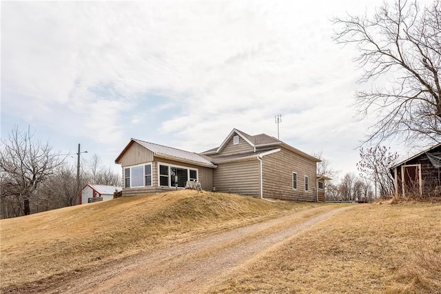 W12141 Hwy 8, Bruce, WI 54819 - view of front of property featuring driveway and a front lawn