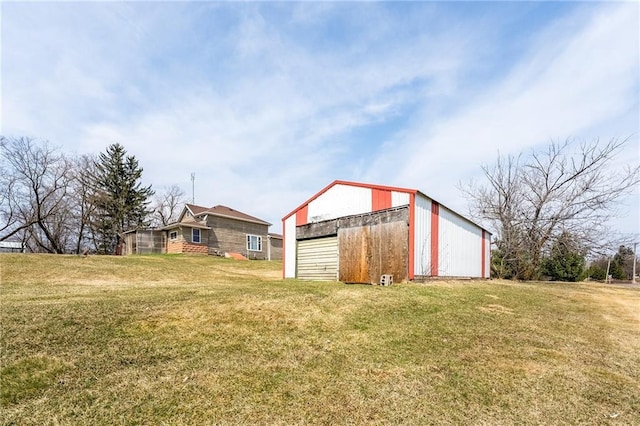 W12141 Hwy 8, Bruce, WI 54819 - view of yard featuring a detached garage, an outbuilding, and an outdoor structure
