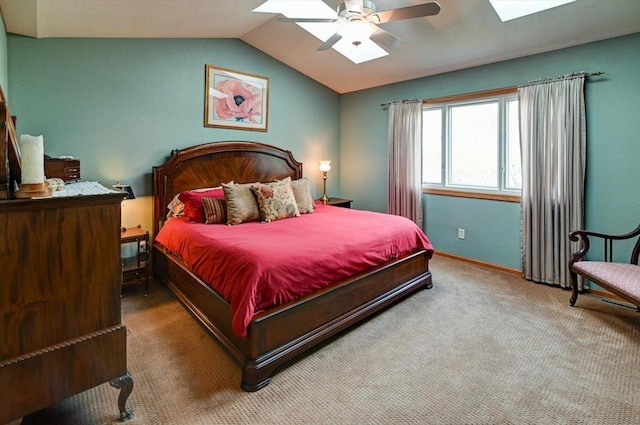 6610 Whittlesey Rd, Middleton, WI 53562 - carpeted bedroom with a skylight, lofted ceiling, a ceiling fan, and baseboards