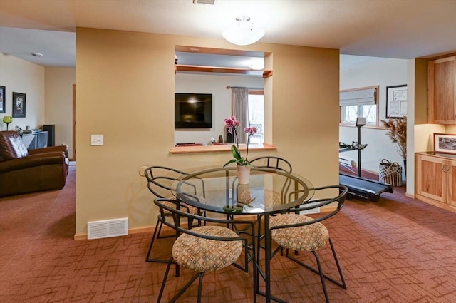 6610 Whittlesey Rd, Middleton, WI 53562 - dining area featuring carpet flooring and baseboards