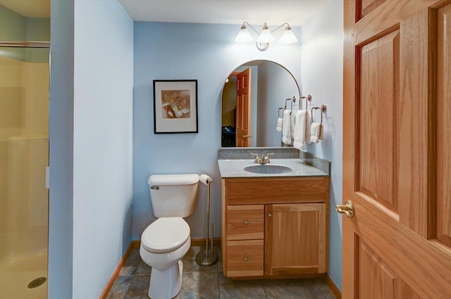 6610 Whittlesey Rd, Middleton, WI 53562 - bathroom with a shower stall, toilet, vanity, and baseboards