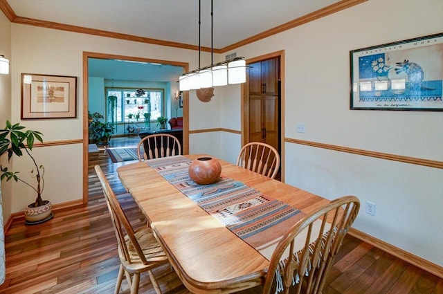 6610 Whittlesey Rd, Middleton, WI 53562 - dining area with baseboards, hardwood / wood-style flooring, and crown molding