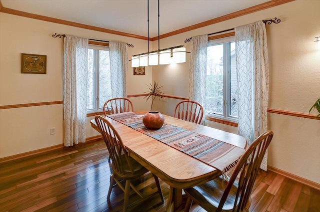 6610 Whittlesey Rd, Middleton, WI 53562 - dining area with wood-type flooring, baseboards, and crown molding