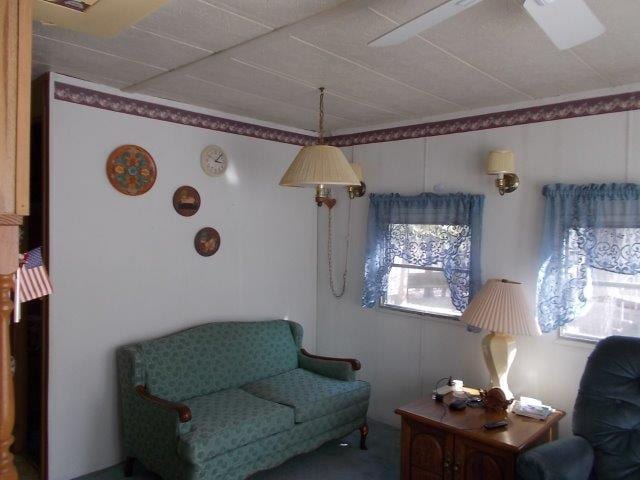 sitting room featuring a healthy amount of sunlight