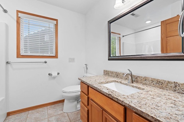 7605 W Windrush Ln, Franklin, WI 53132 - full bathroom with a shower, baseboards, toilet, vanity, and tile patterned floors